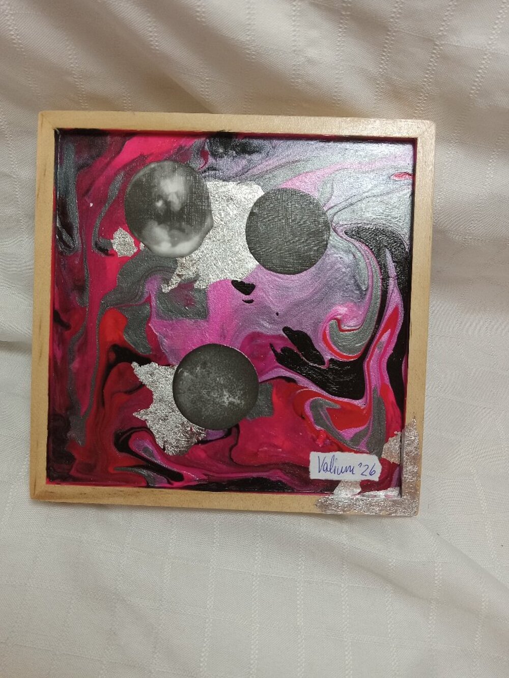 Collage on a liquid art panel, mixted media acrylic with silver foil